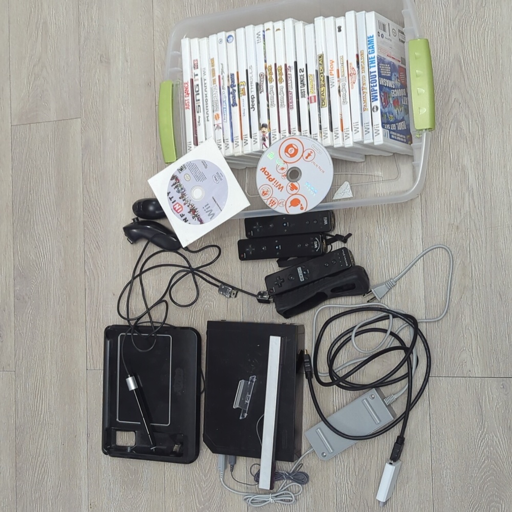 Wii System Remote and Tons of Games